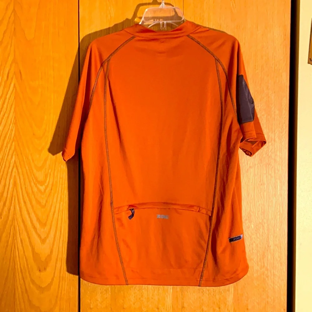 Zoic 1/2 zip orange cycling biking jersey men LARGE reflective details pocket